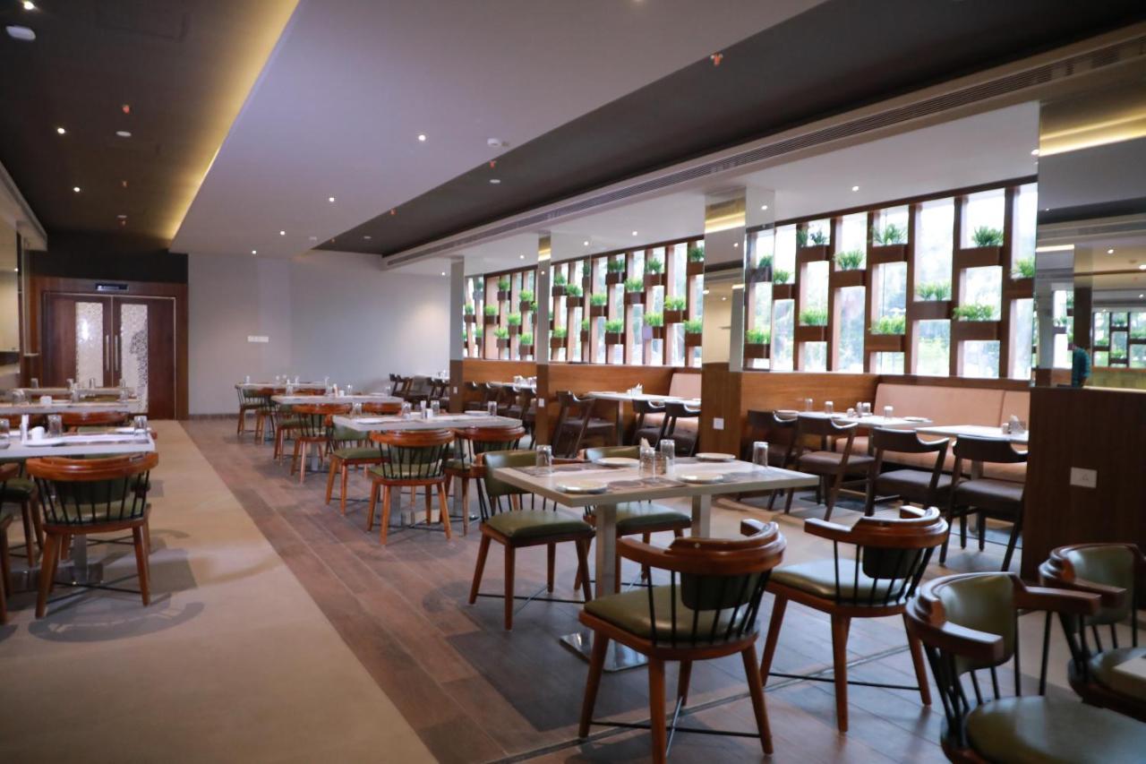 Magnet Hotel Каннур Экстерьер фото