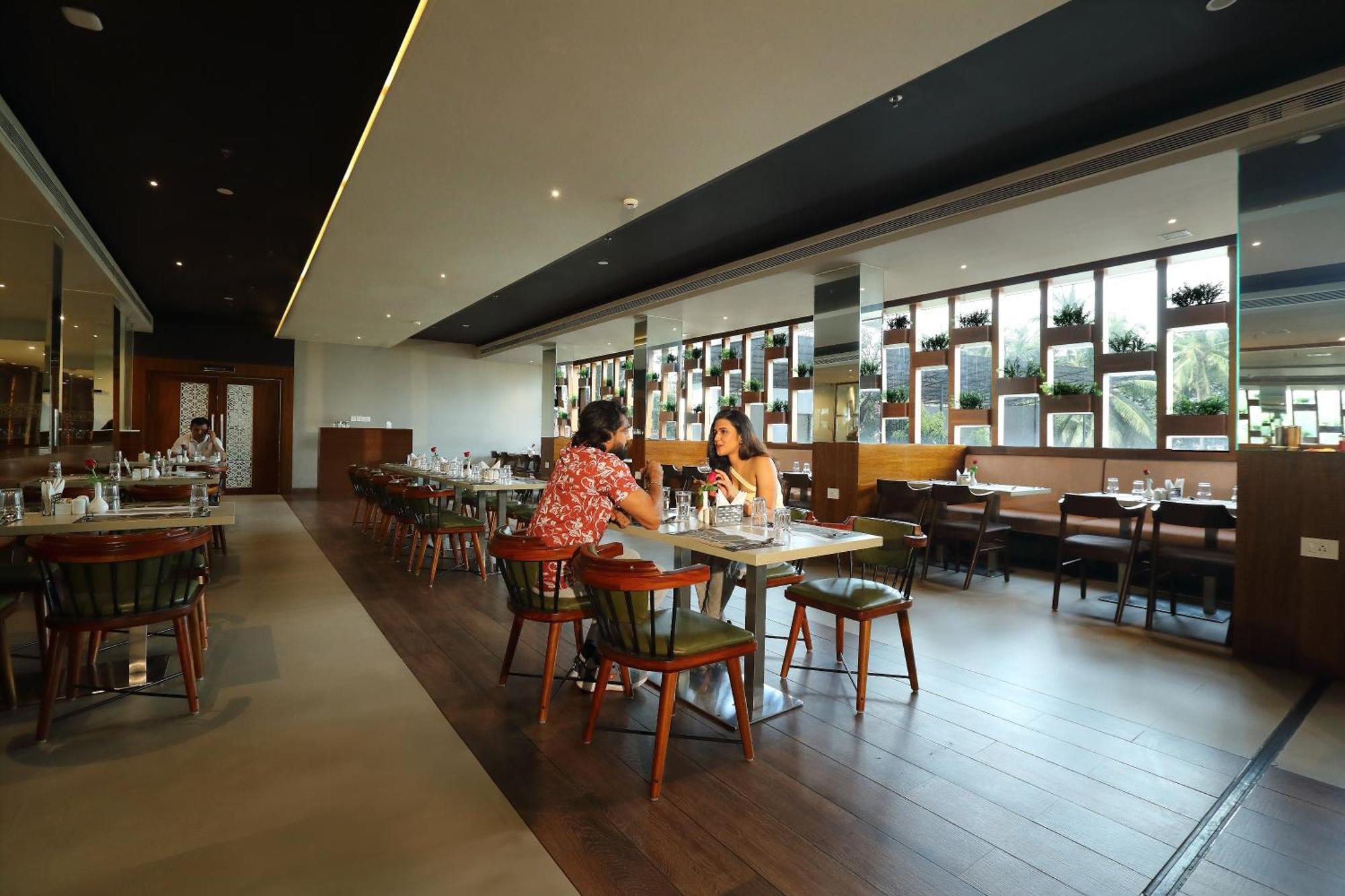 Magnet Hotel Каннур Экстерьер фото