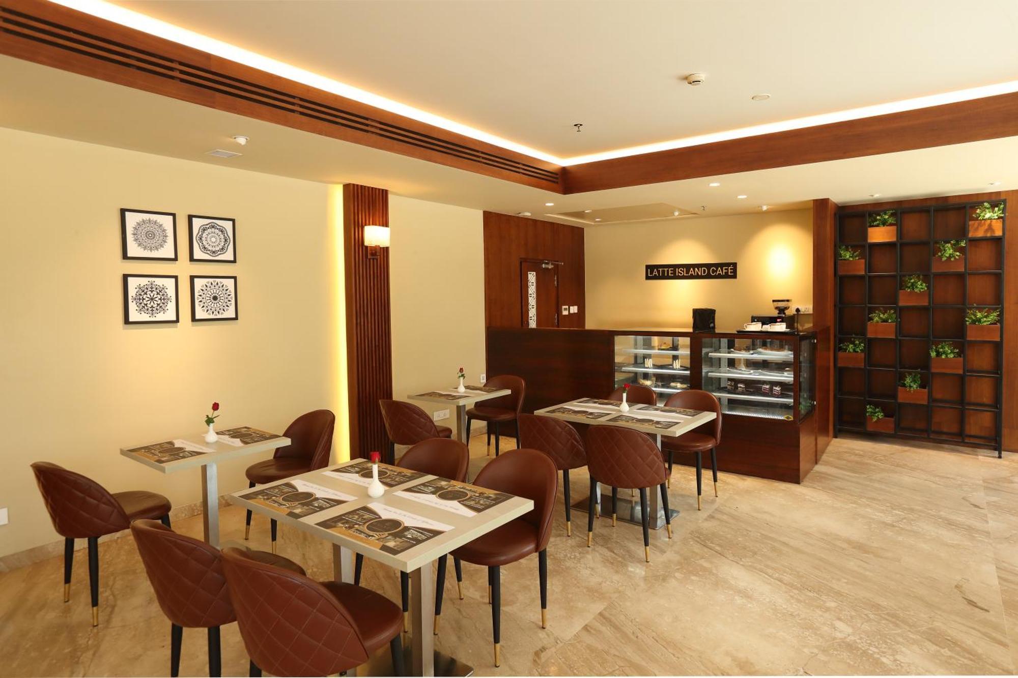 Magnet Hotel Каннур Экстерьер фото